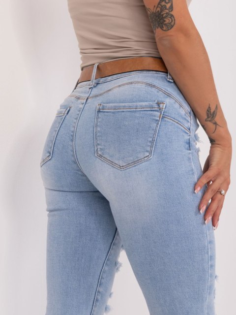 Jasnoniebieskie spodnie jeansowe skinny z dziurami Jasnoniebieskie spodnie jeansowe skinny z dziurami