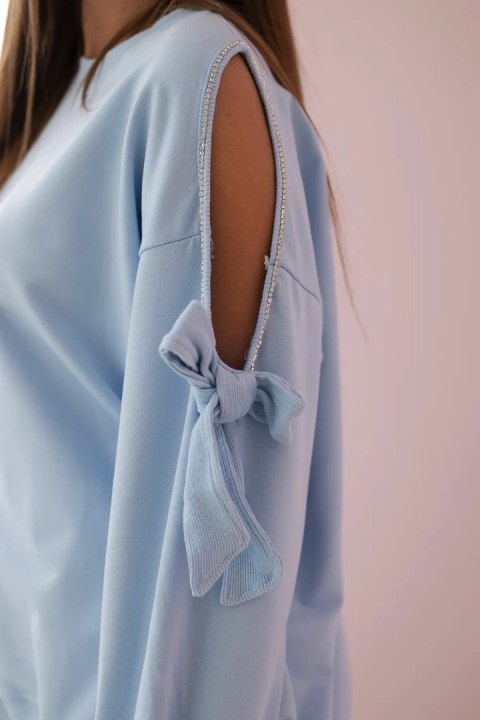 Komplet bluzy z kokardą na rękawach i legginsów niebieski Komplet bluzy z kokardą na rękawach i legginsów niebieski