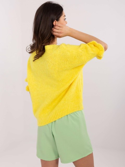 Sweter oversize z dodatkiem wełny z falbanką na rękawie Sweter oversize z dodatkiem wełny z falbanką na rękawie